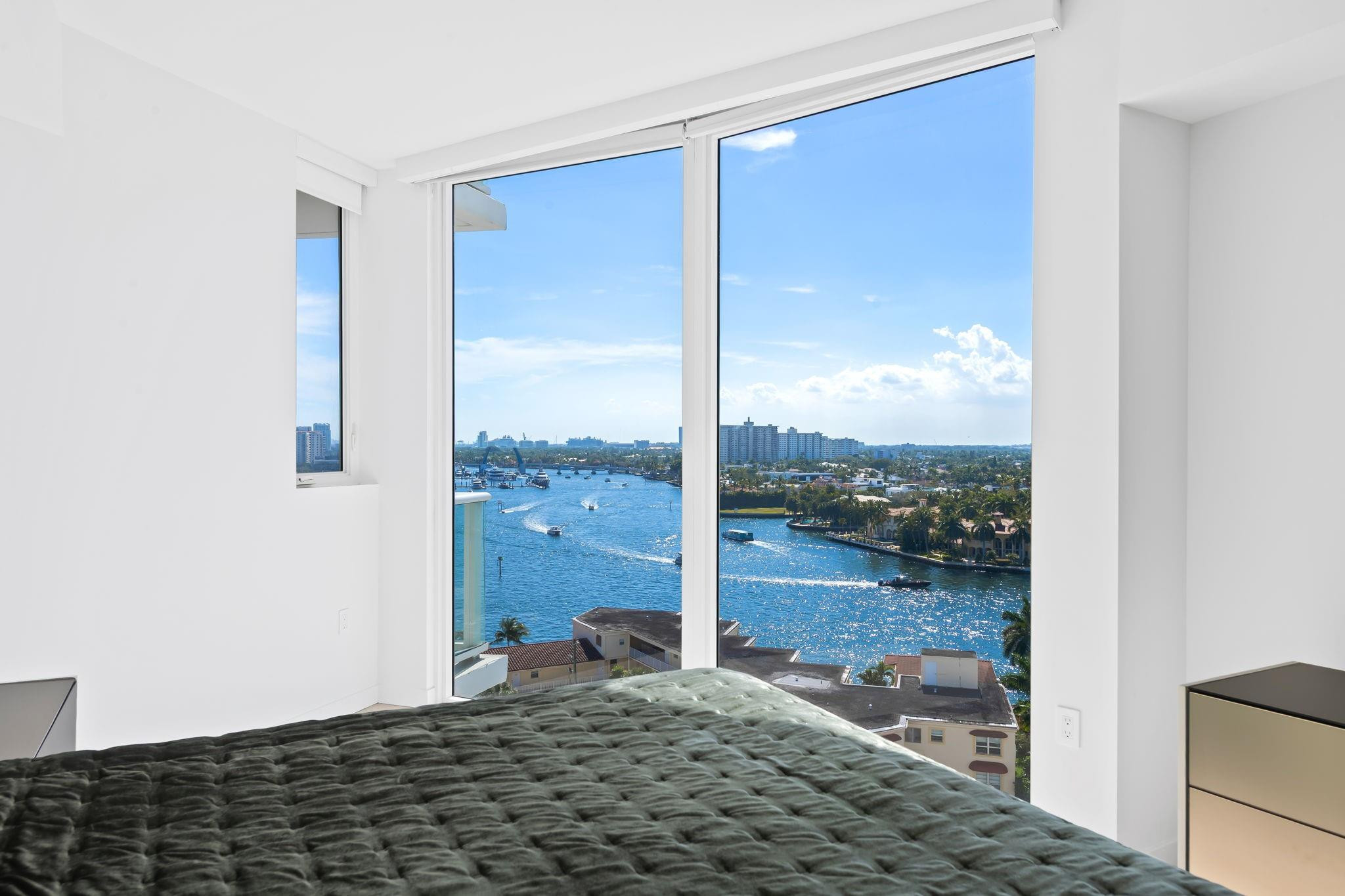 401 North Birch Road, Unit 1100 Fort Lauderdale, FL 33304 - Photo 9 of 30 a view of a porch with a floor to ceiling window and an empty room