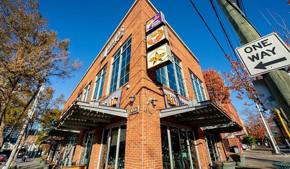 1045 Piedmont Avenue Northeast, Unit 1B1BA Atlanta, GA 30309 - Photo 14 of 16 a view of a street with building