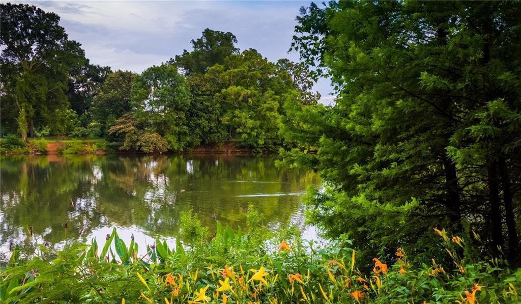 1045 Piedmont Avenue Northeast, Unit 1B1BA Atlanta, GA 30309 - Photo 16 of 16 a lake view with a garden
