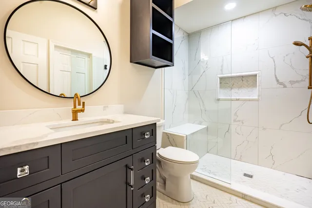 a bathroom with a sink a vanity and a mirror