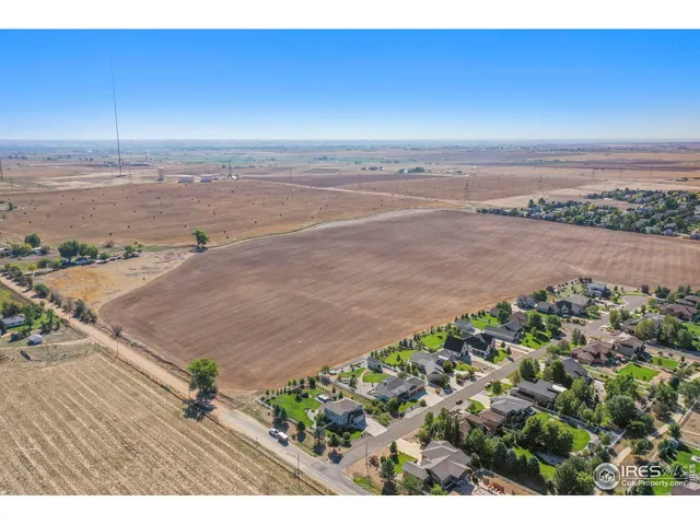 an aerial view of beach and city