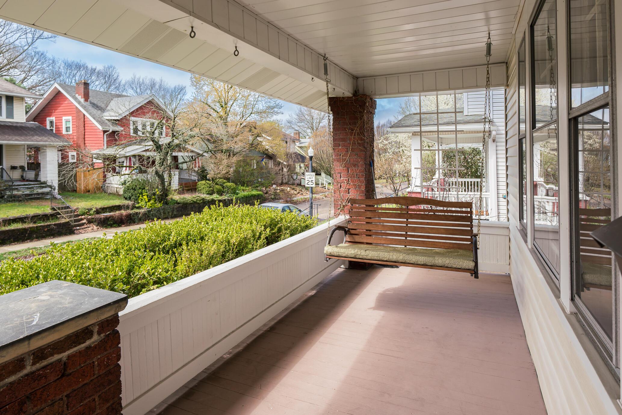 214 East Pacemont Road Columbus, OH 43202 - Photo 2 of 38 Full front porch with swing