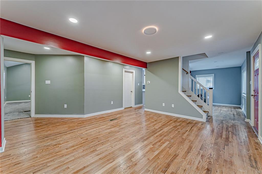 414 Hochberg Road Pittsburgh, PA 15235 - Photo 9 of 23 a view of an empty room with wooden floor