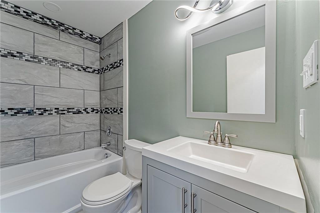 414 Hochberg Road Pittsburgh, PA 15235 - Photo 10 of 23 a bathroom with a sink a toilet and shower