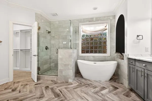 a bathroom with a double vanity sink and mirror