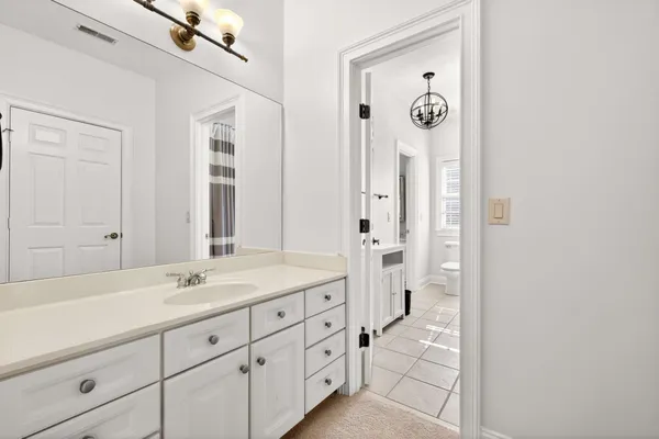 an aerial view of a house with a lake view