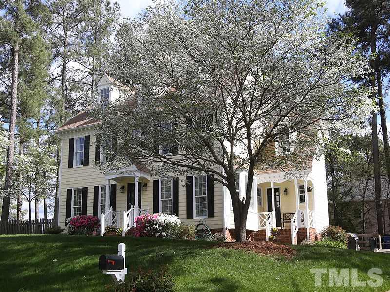 2501 Bredon Court Raleigh, NC 27613 - Photo 2 of 25 a front view of house with yard and green space