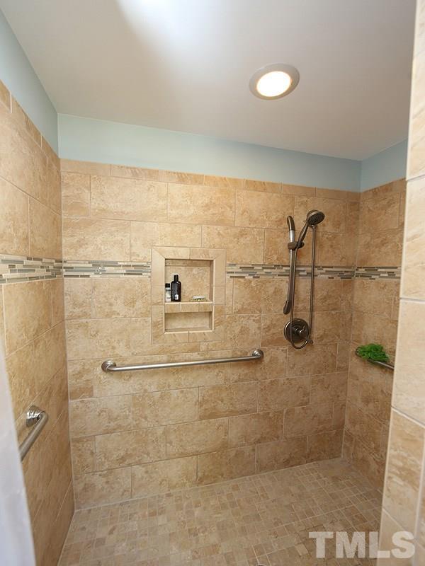 2501 Bredon Court Raleigh, NC 27613 - Photo 16 of 25 a bathroom with a shower