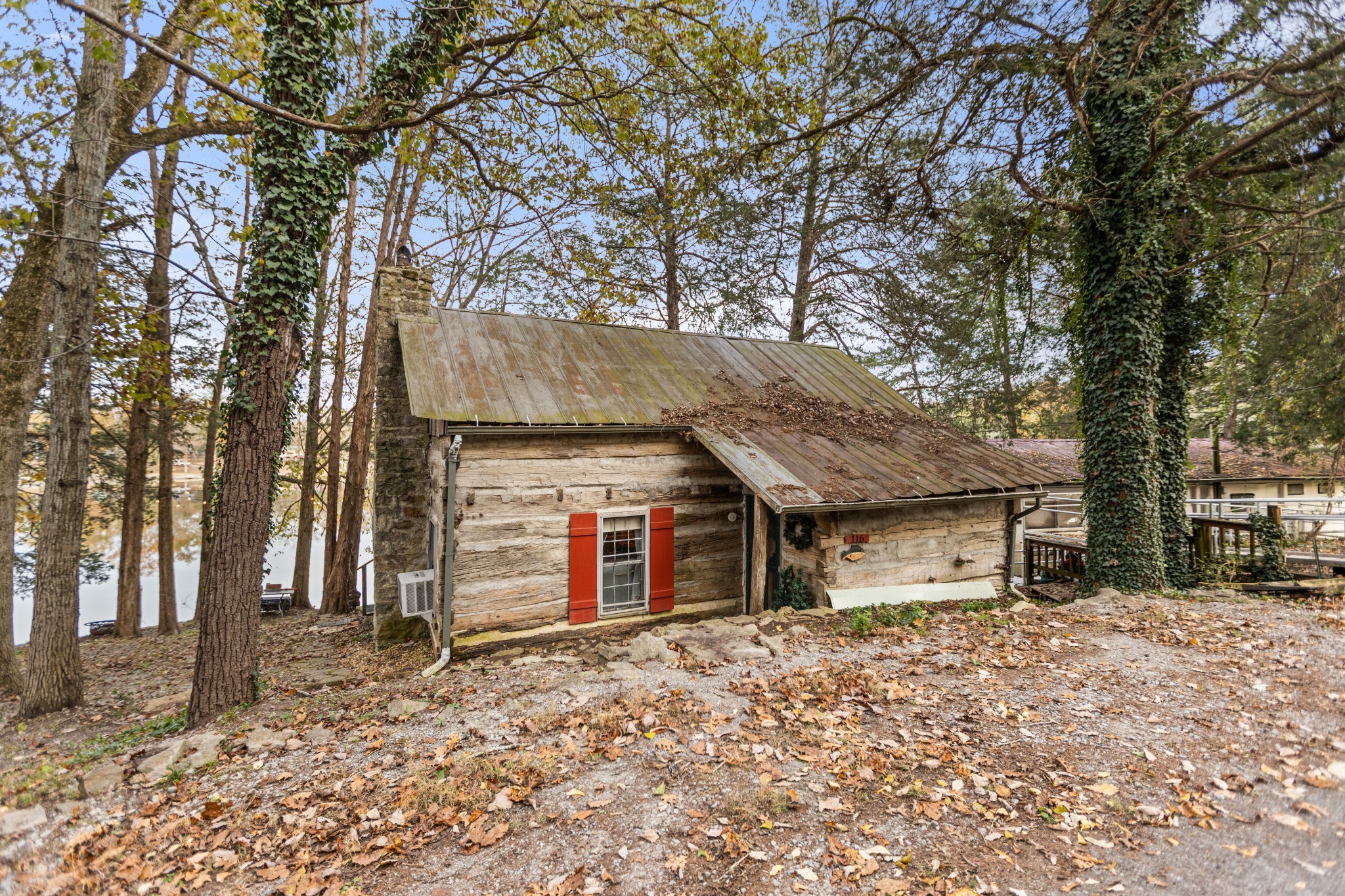 116 Lincoln Lake Road Kelso, TN 37348 - Photo 1 of 46 a view of a house with a yard and garage
