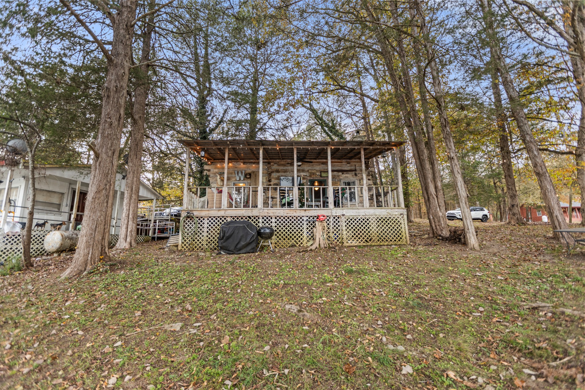 116 Lincoln Lake Road Kelso, TN 37348 - Photo 16 of 46 a view of a house with a yard