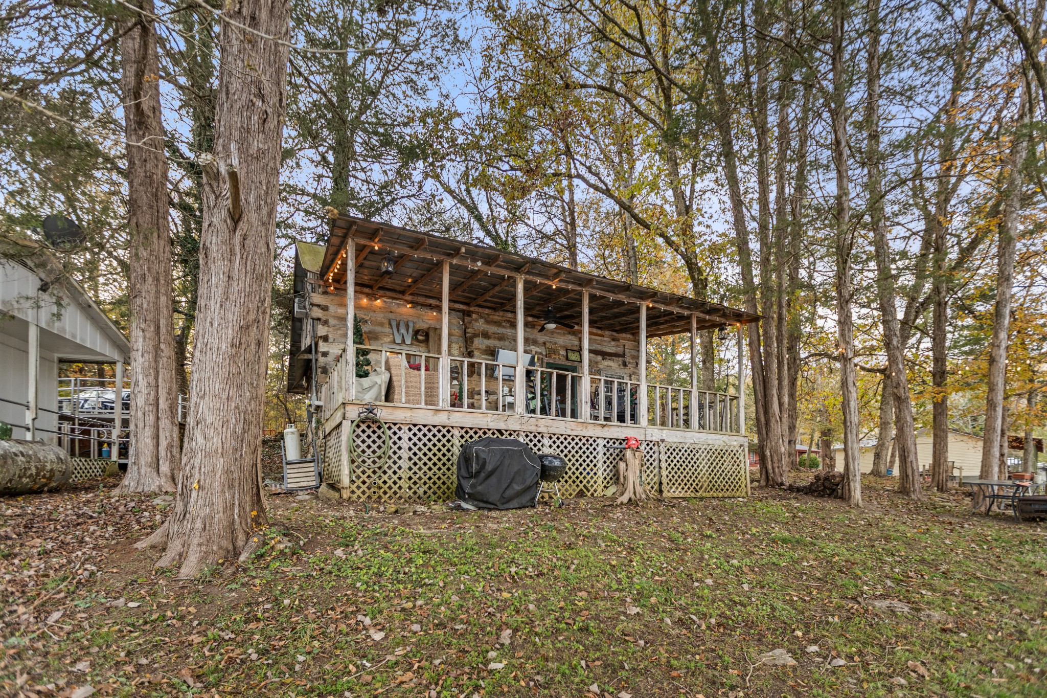 116 Lincoln Lake Road Kelso, TN 37348 - Photo 17 of 46 a front view of a house with a garden