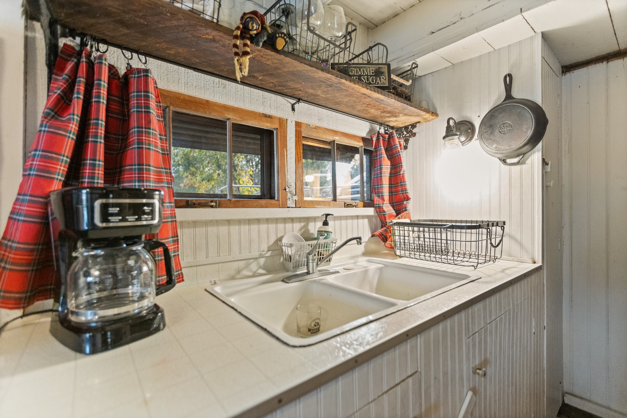 116 Lincoln Lake Road Kelso, TN 37348 - Photo 26 of 46 a kitchen with a sink and a stove next to a window