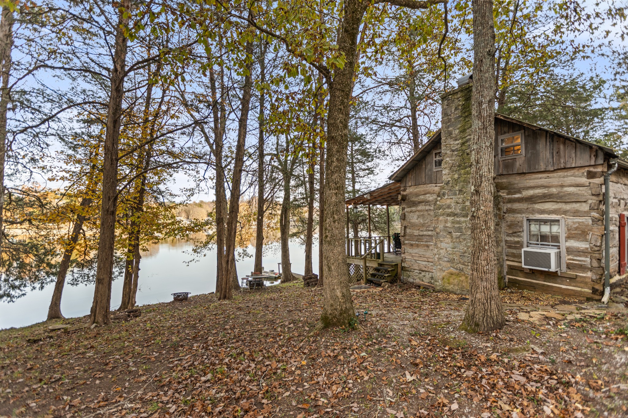 116 Lincoln Lake Road Kelso, TN 37348 - Photo 43 of 46 a backyard of a house with lots of green space