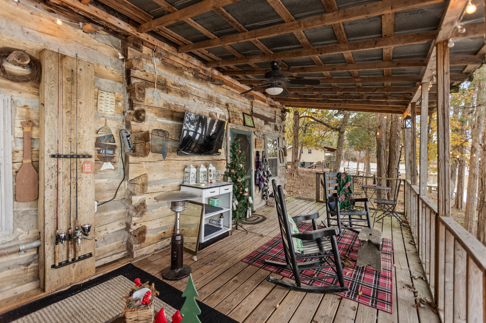 116 Lincoln Lake Road Kelso, TN 37348 - Photo 9 of 46 a view of a chairs and table in a patio