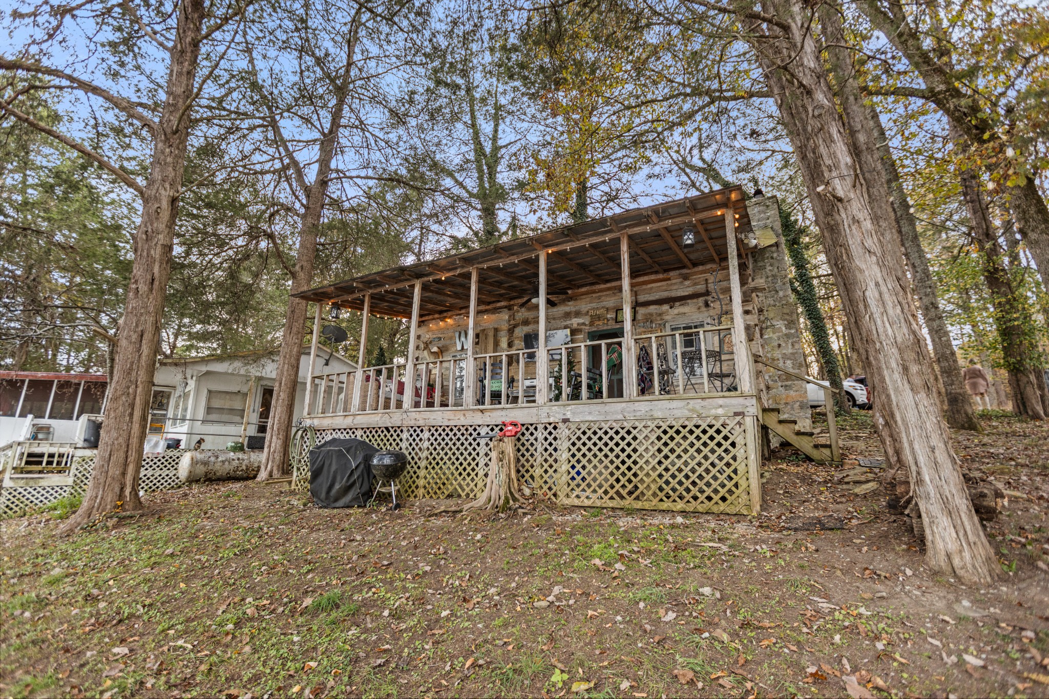 116 Lincoln Lake Road Kelso, TN 37348 - Photo 10 of 46 a front view of a house with a yard
