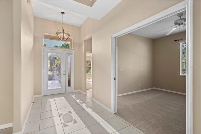 a view of an empty room and window