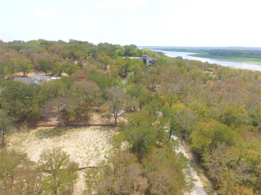 9220 Apache Trail Flower Mound, TX 75022 - Photo 1 of 1 a view of a lake view and mountain view