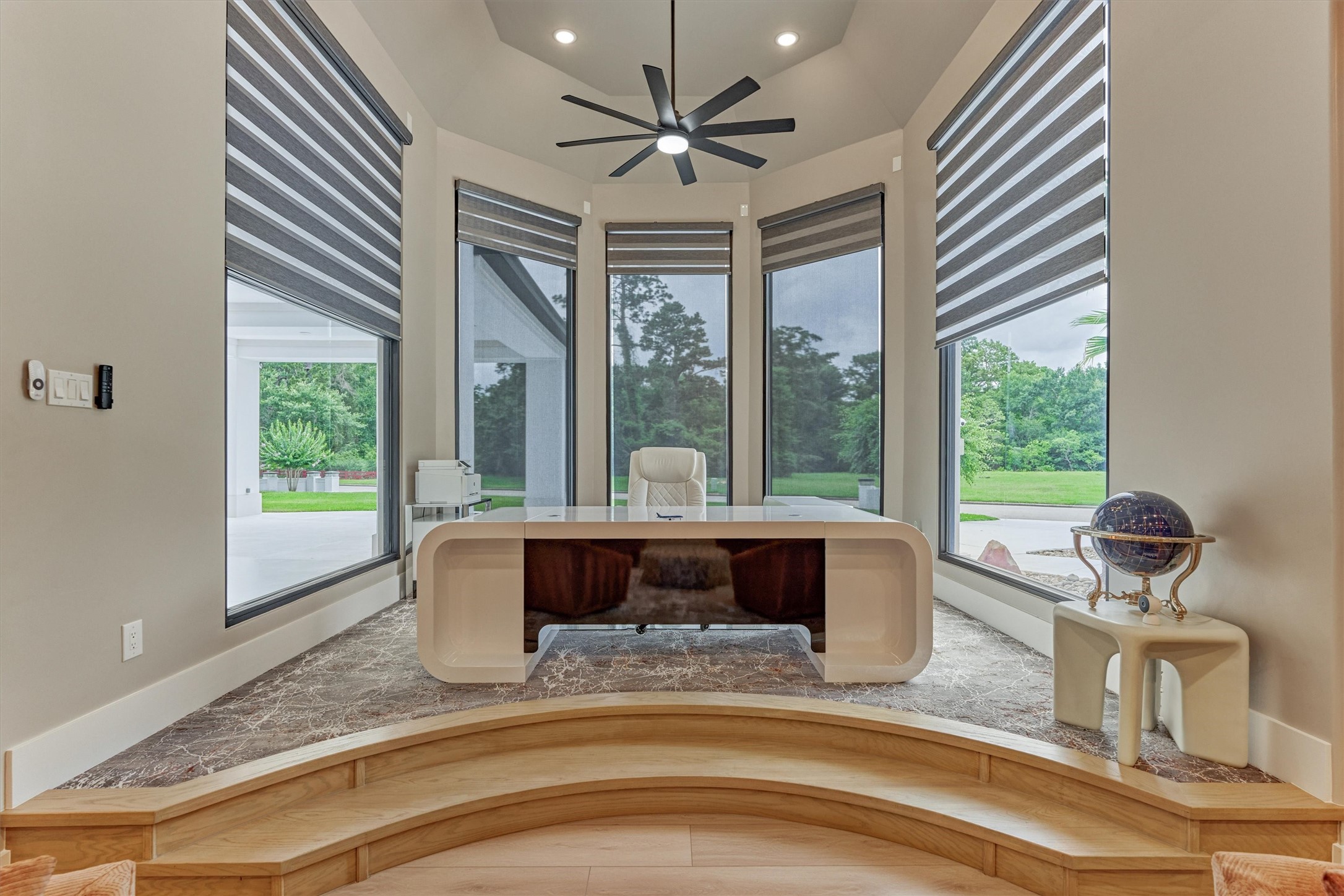 1907 Woerner Road Houston, TX 77090 - Photo 7 of 50 A home office unlike any other, surrounded by soaring windows with automatic shades and elevated to create a truly modern ambiance.
