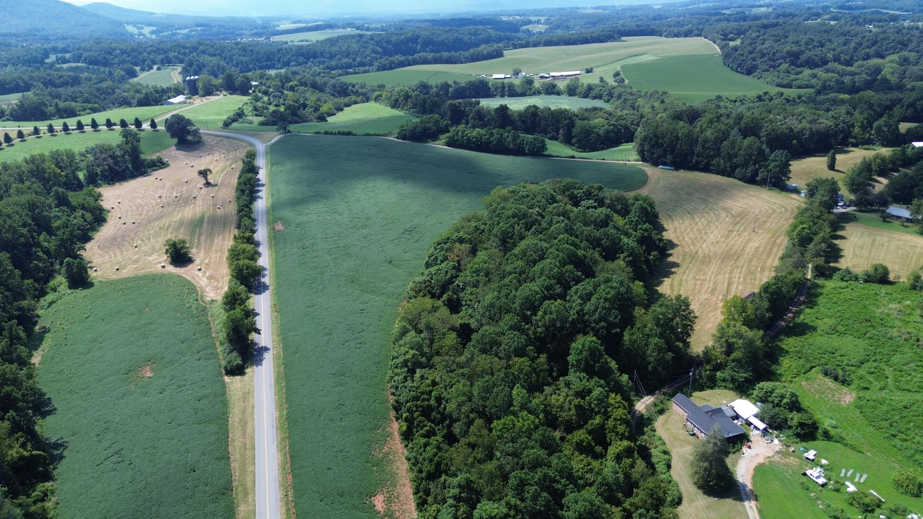 Tract A Hopkins Road Rocky Mount, VA 24151 - Photo 3 of 6 an aerial view of a house with a yard