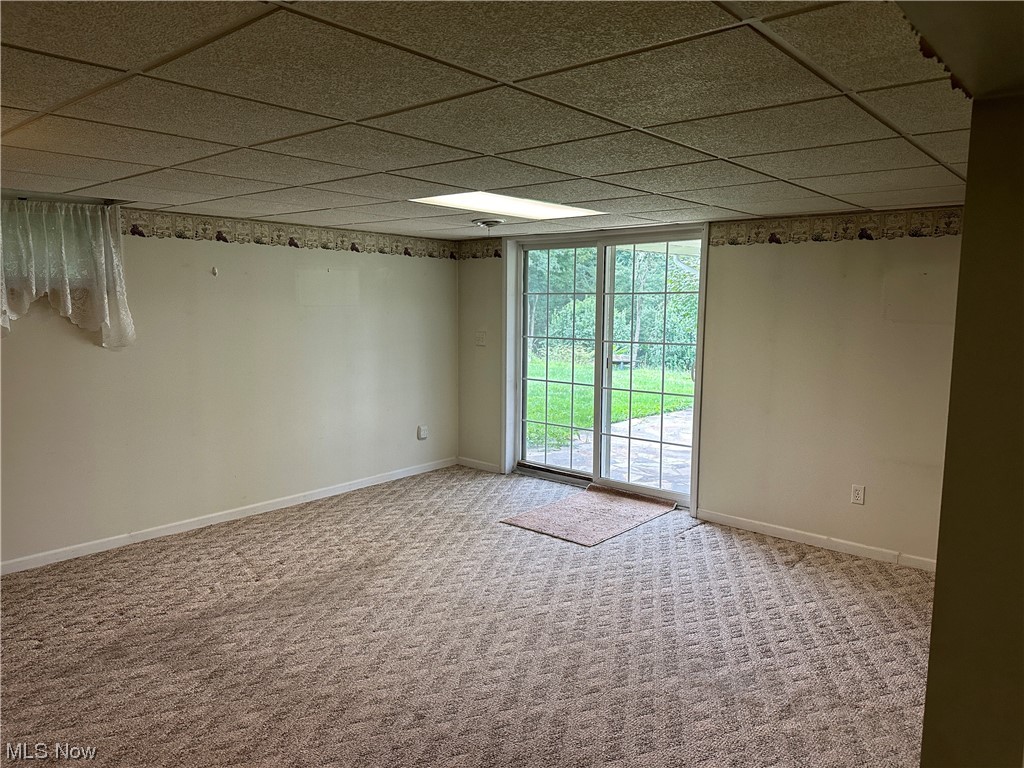 62273 Tacoma Road Barnesville, OH 43713 - Photo 28 of 34 Carpeted spare room featuring a drop ceiling