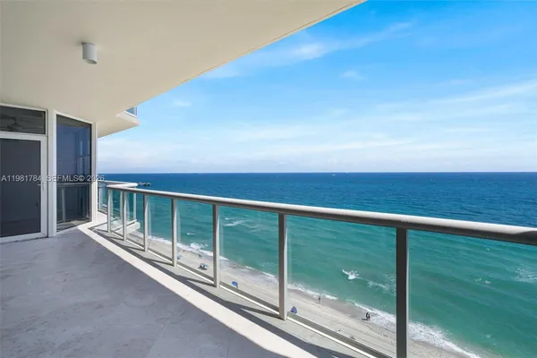 a view of balcony with ocean view