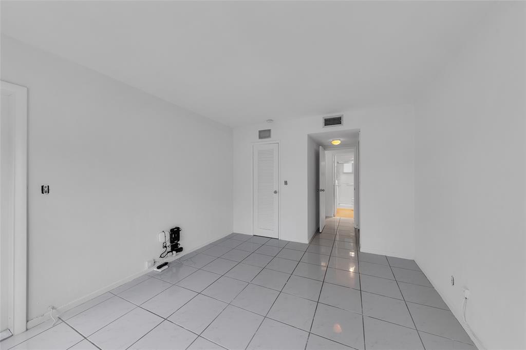 2151 Northeast 42nd Court, Unit 230 Lighthouse Point, FL 33064 - Photo 27 of 40 a view of an empty room