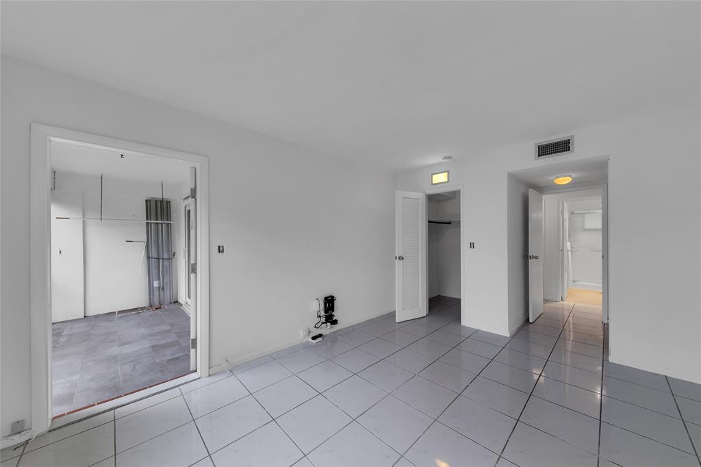 2151 Northeast 42nd Court, Unit 230 Lighthouse Point, FL 33064 - Photo 29 of 40 a view of an empty room