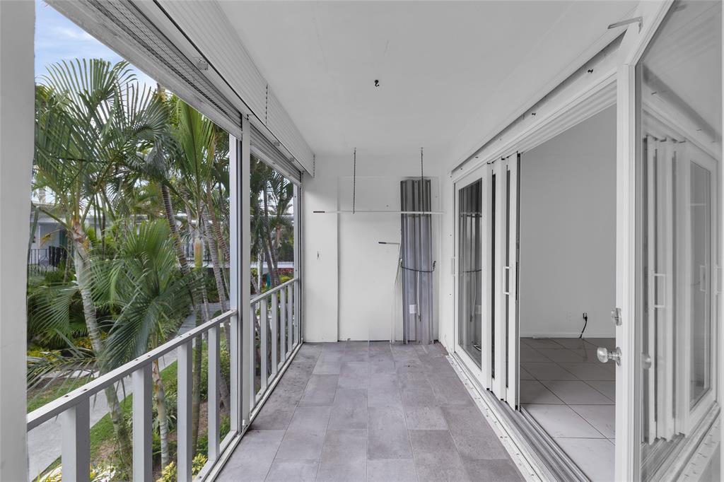 2151 Northeast 42nd Court, Unit 230 Lighthouse Point, FL 33064 - Photo 30 of 40 a view of a balcony