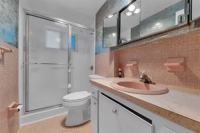 a view of a park with swings and a table