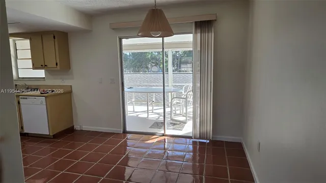 a view of a room with a window