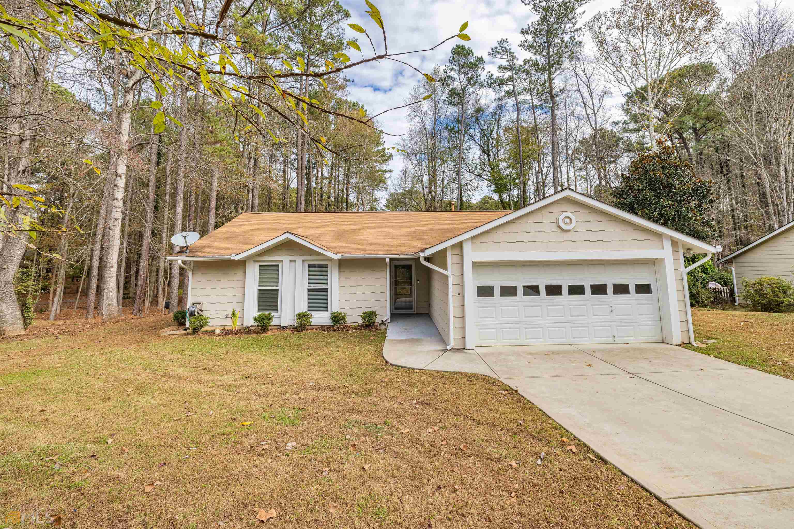 108 Pheasant Ridge Peachtree City, GA 30269 - Photo 1 of 1 a view of a house with a yard and large tree