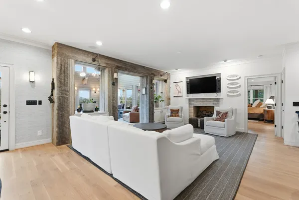 a kitchen with stainless steel appliances kitchen island granite countertop a sink and cabinets