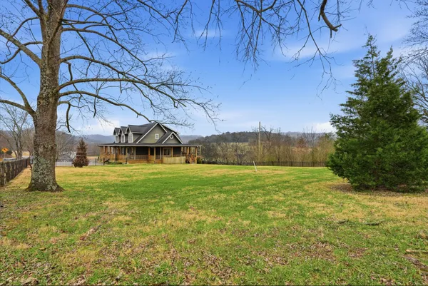 a view of a balcony with wooden floor
