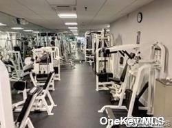 12-31 Robin Lane, Unit TRIPLEX Queens, NY 11360 - Photo 17 of 17 a view of a room with gym equipment