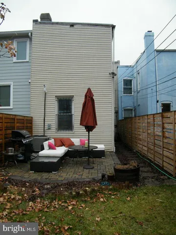 a backyard of a house with seating space