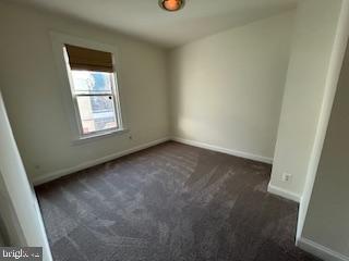 756 Morton Street Northwest Washington, DC 20010 - Photo 6 of 13 an empty room with windows