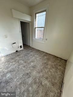 756 Morton Street Northwest Washington, DC 20010 - Photo 7 of 13 an empty room with windows