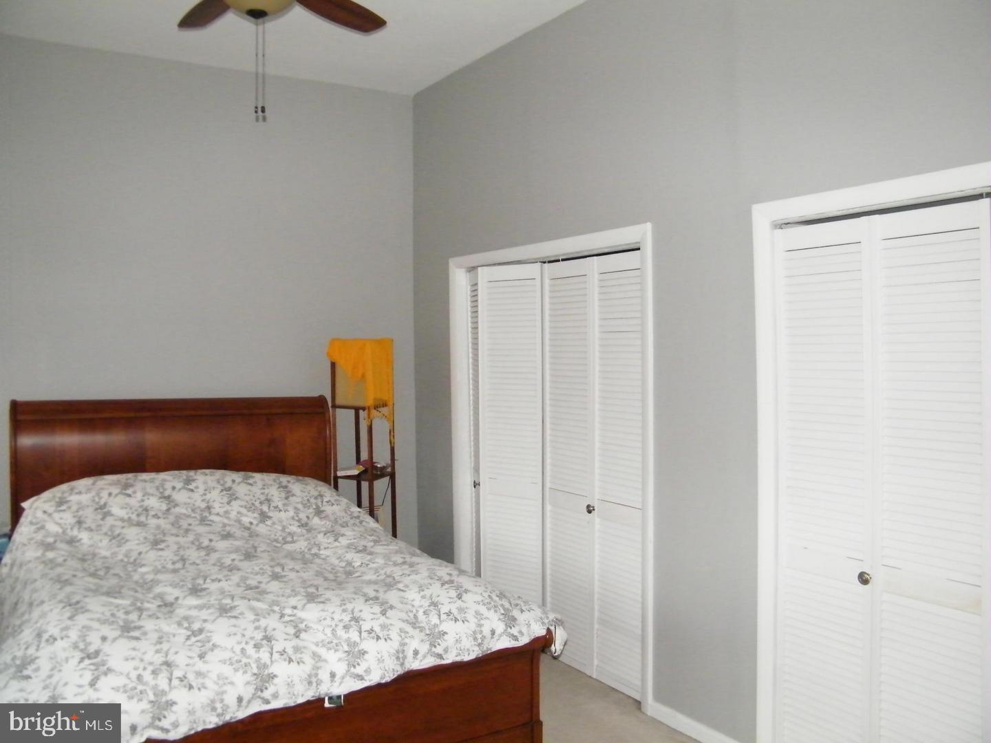 756 Morton Street Northwest Washington, DC 20010 - Photo 9 of 13 a bedroom with a bed and a dresser