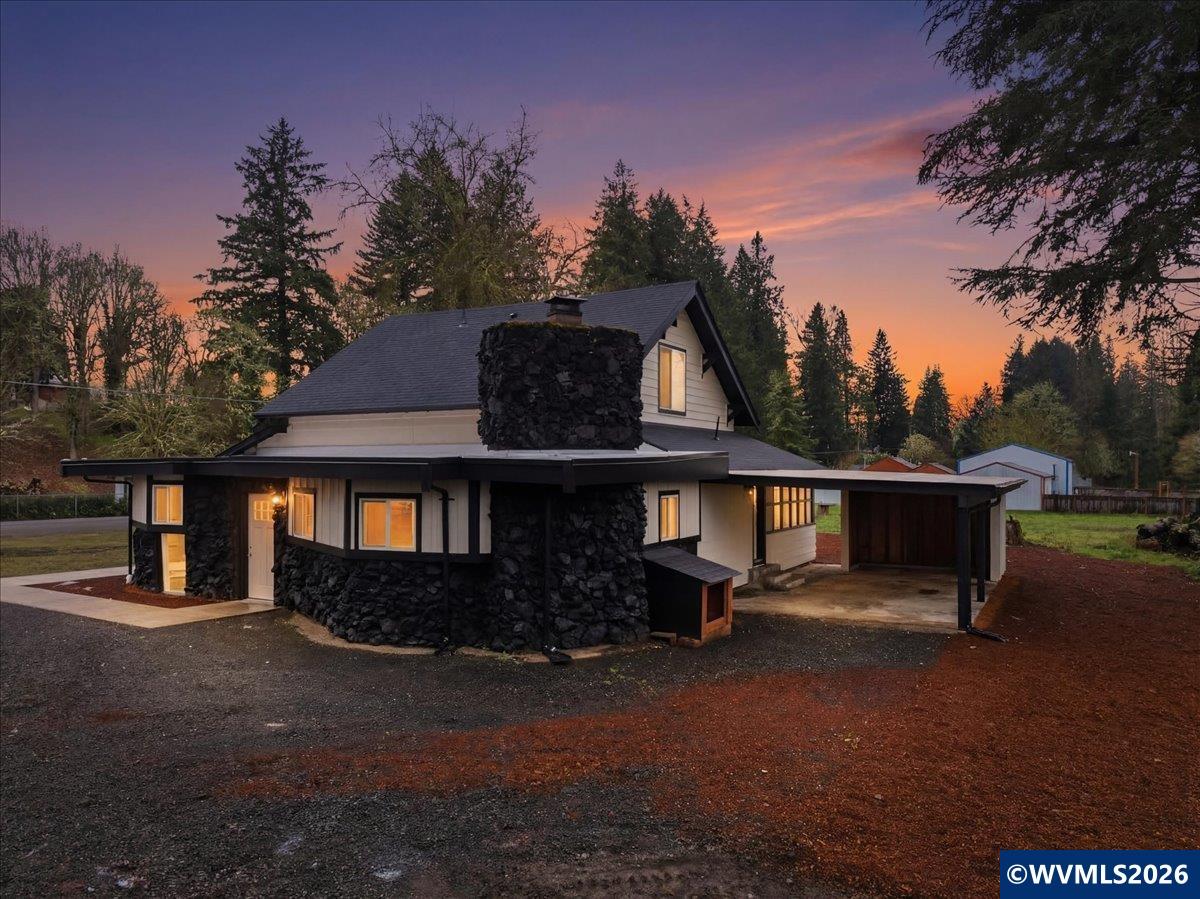 28411 Liberty Road Sweet Home, OR 97386 - Photo 9 of 50 a front view of a house with a yard