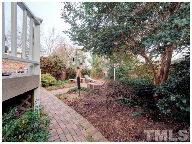 220 Hillcrest Road Raleigh, NC 27605 - Photo 22 of 24 a view of a back yard of the house