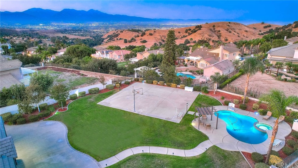 16087 Promontory Road Chino Hills, CA 91709 - Photo 1 of 1 an aerial view of residential house with outdoor space and pool