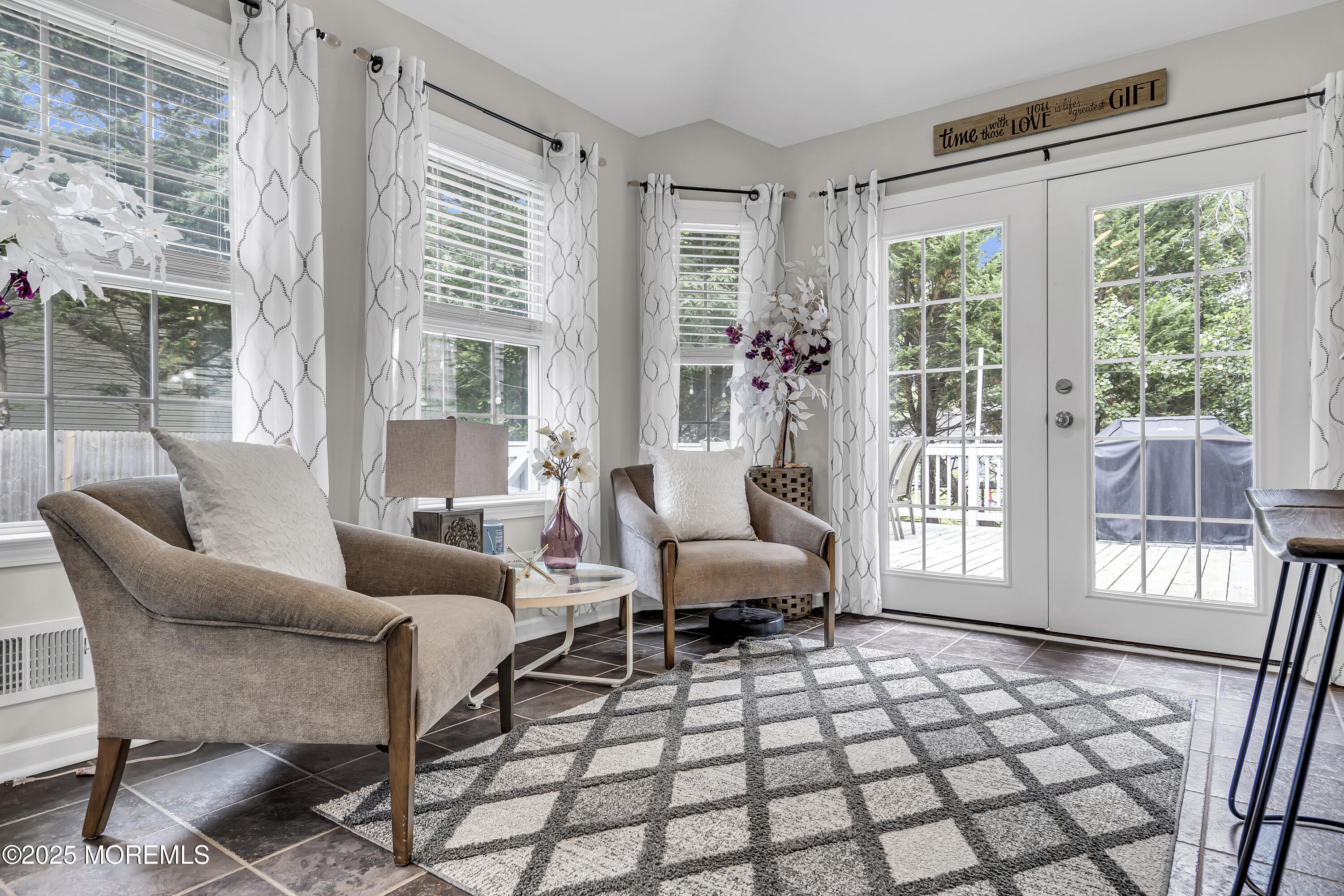 167 Captain Road Manahawkin, NJ 08050 - Photo 21 of 86 a living room with furniture and a large window