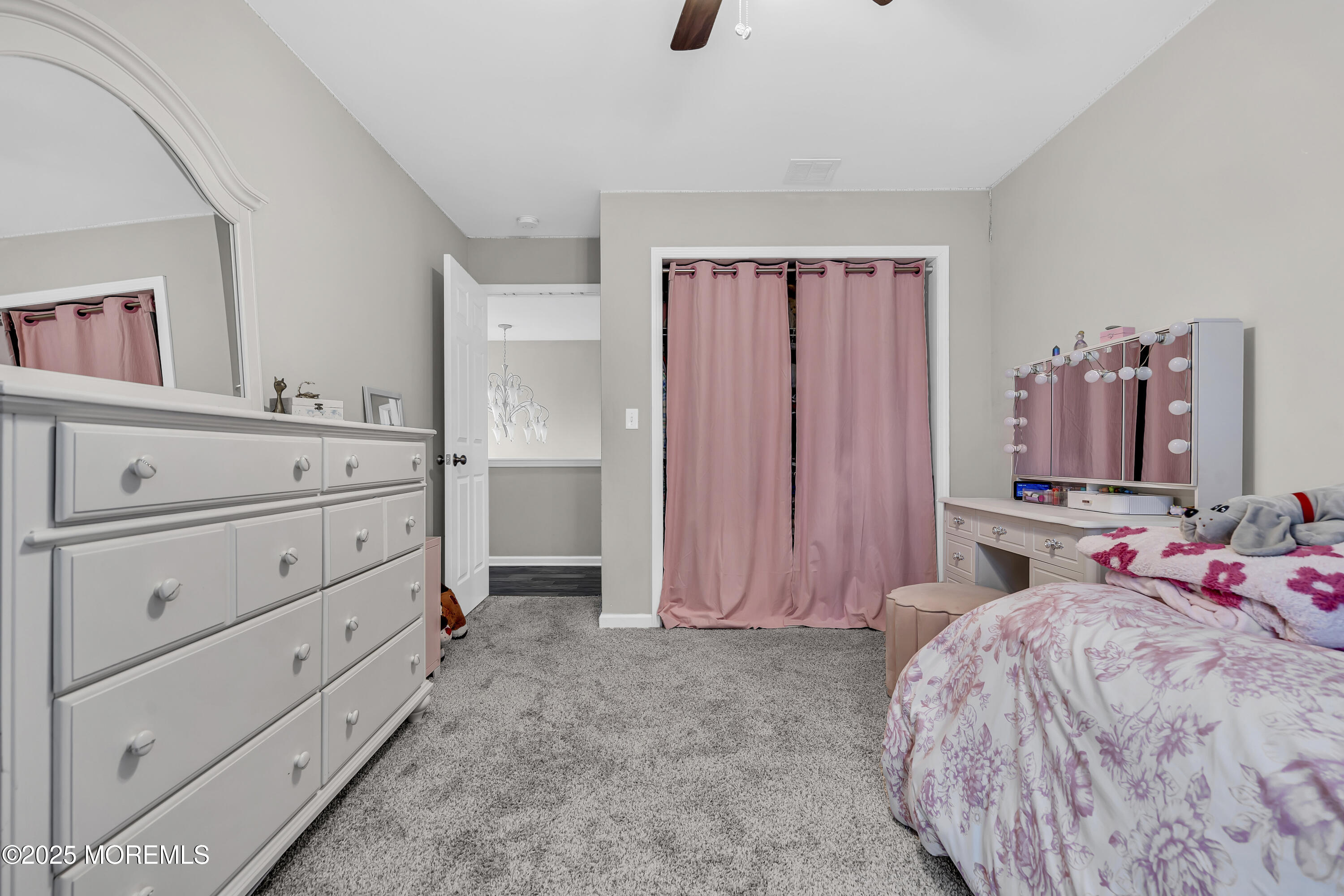 167 Captain Road Manahawkin, NJ 08050 - Photo 57 of 86 a bed room with a bed and a closet
