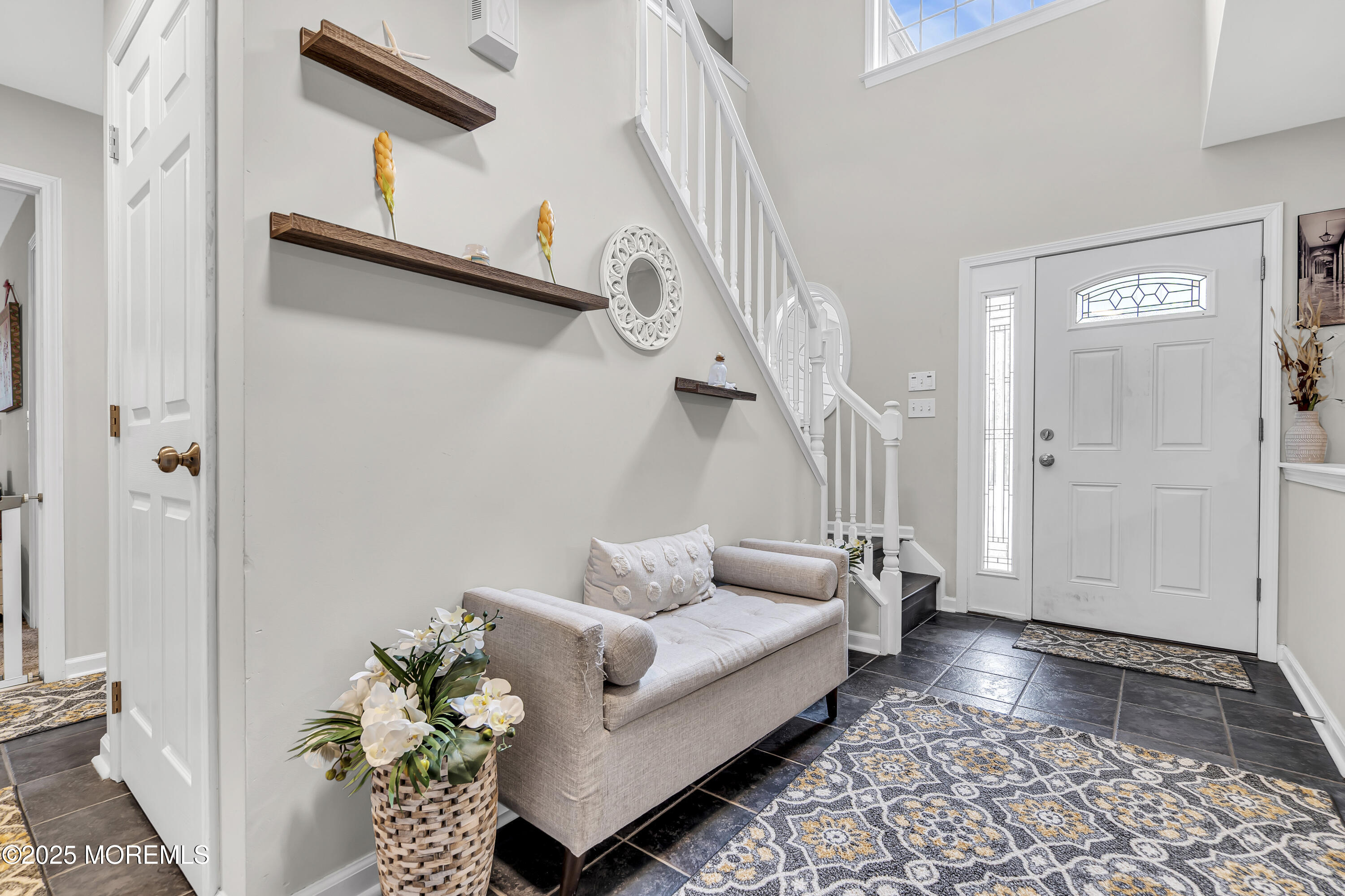 167 Captain Road Manahawkin, NJ 08050 - Photo 6 of 86 a living room with furniture and wooden floor
