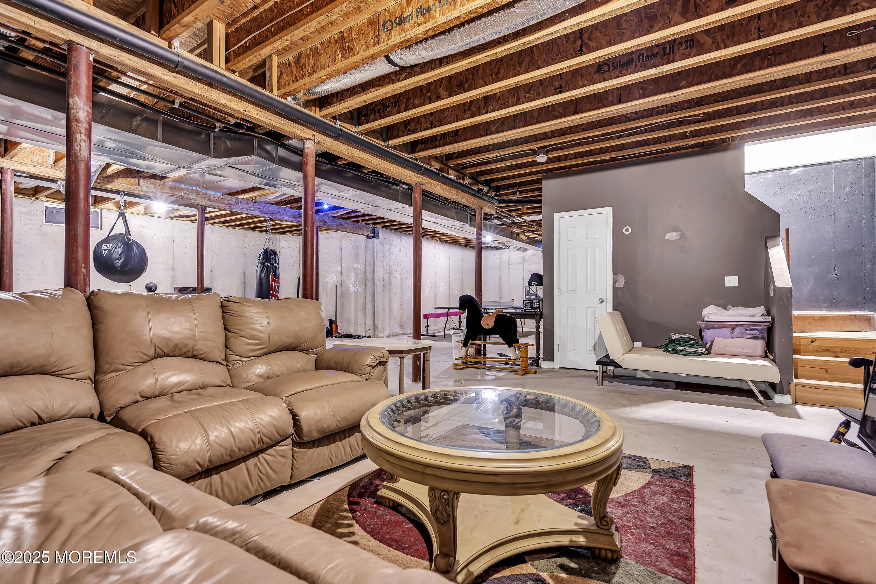 167 Captain Road Manahawkin, NJ 08050 - Photo 68 of 86 a living room with furniture and a large window