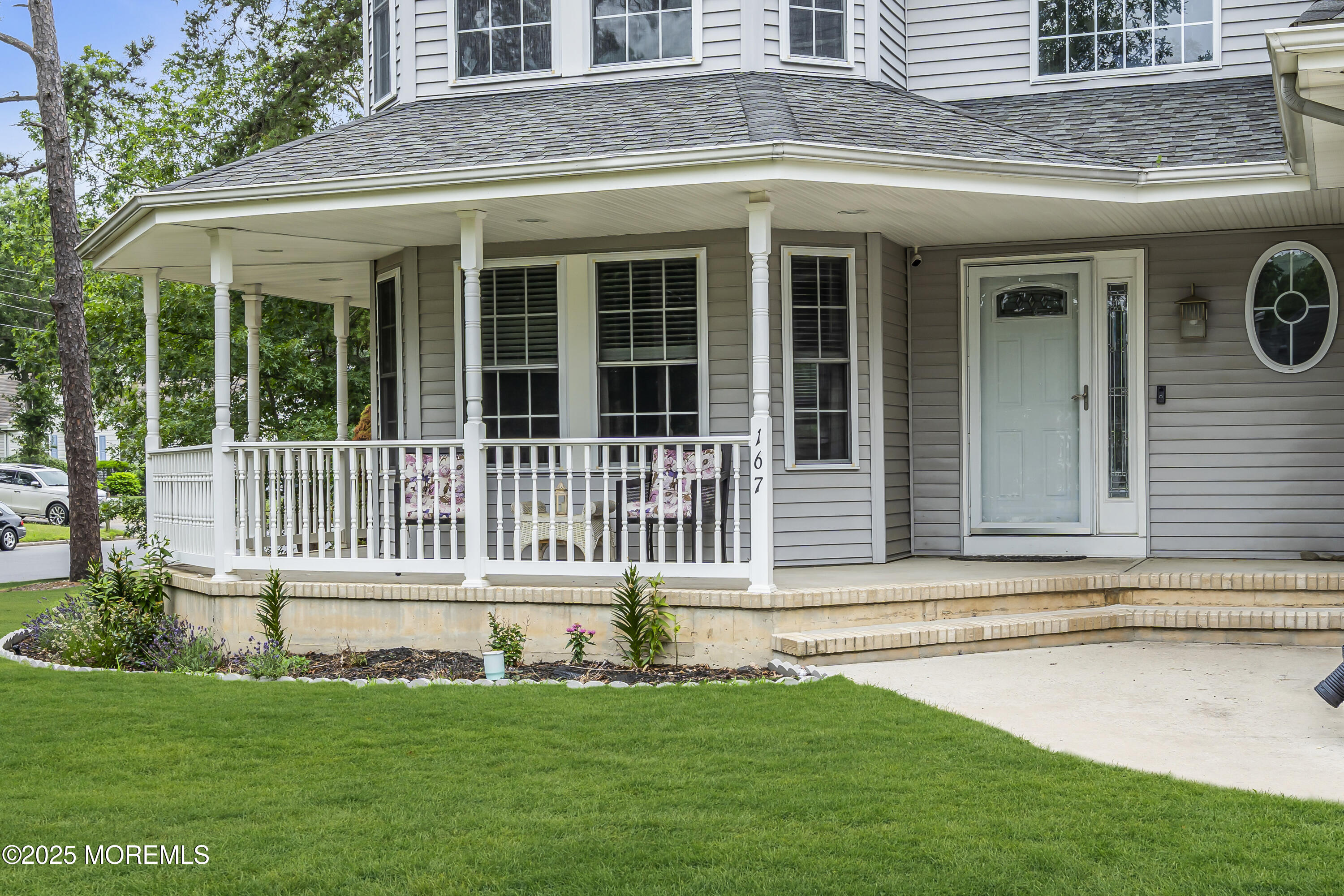 167 Captain Road Manahawkin, NJ 08050 - Photo 82 of 86 a view of a house with a yard and sitting area