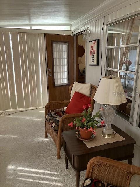 3405 Lanark Drive Holiday, FL 34690 - Photo 23 of 32 a living room with furniture and a window