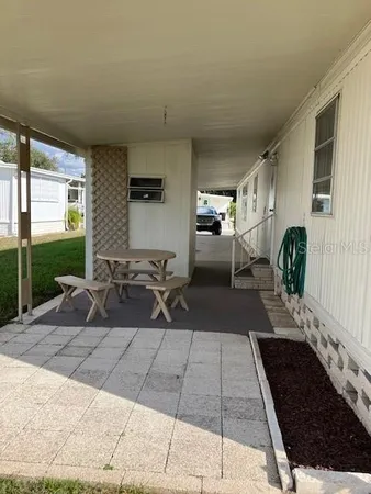 a front view of a house with wooden floor