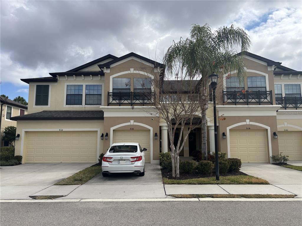 a car parked in front of a house