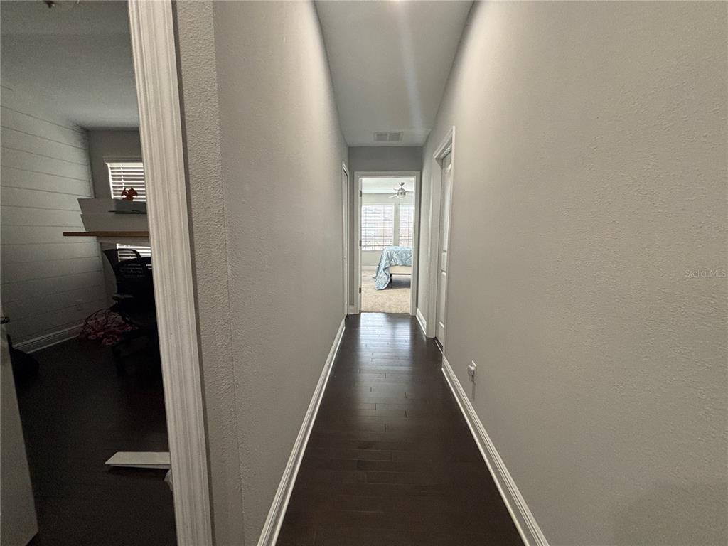 9136 Fox Sparrow Road Tampa, FL 33626 - Photo 26 of 34 a view of a hallway with a closet